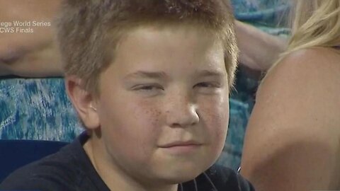 Kid's epic staredown with ESPN cameras at the NCAA Baseball