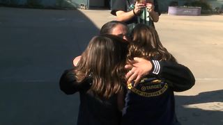 Mother returns from deployment, surprises kids