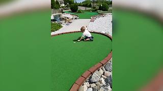 Little Boy Bends Rules Of Mini Golf