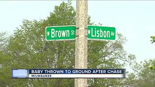 Man throws infant to ground after police chase