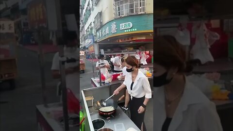 Simple Chinese Girl Prepares Street Food