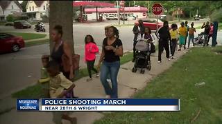 Community members, police march in honor of fallen officer