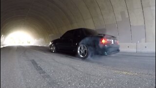 1992 Ford Foxbody Mustang Coupe Burning Tires in a Tunnel