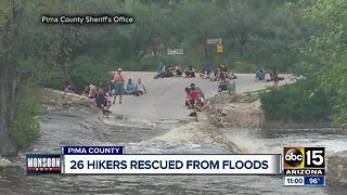 Helicopter rescues 26 stranded by flooding in Arizona canyon