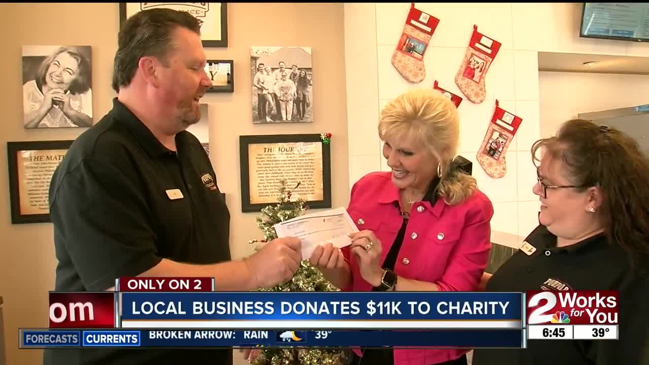 Local business collects over $11K for charity