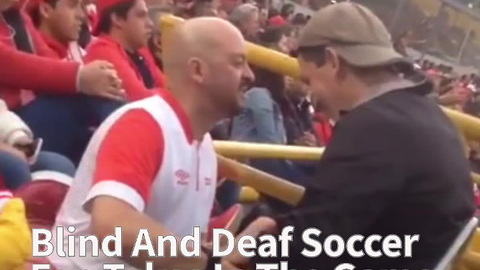 Blind And Deaf Soccer Fan Takes In The Game With Help From His Dad