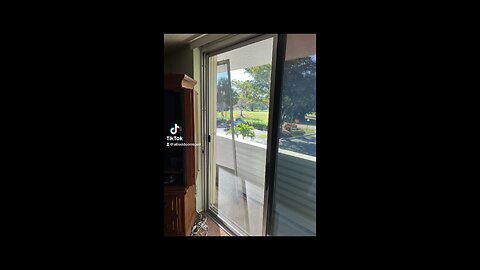 New sliding screen door procurement and installation in Pompano Beach, Florida.