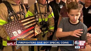 Firefighters make special presentation to child with autism