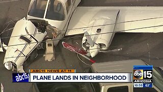 Plane crash lands onto Phoenix street