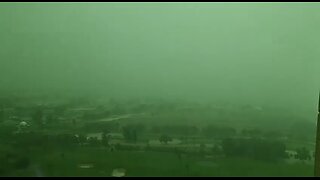 Dubai's sky transforms to green amidst intense rain and thunderstorms in the UAE