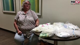 Local woman creates gowns from wedding dresses as special tribute to infants