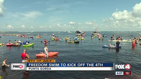 Swimmers and paddlers hit the water for Freedom Swim in Punta Gorda
