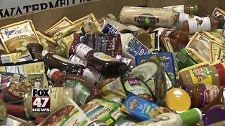 Local businesses collect food donations for those in need