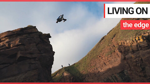 Breathtaking video captures daredevil backflipping off 51ft cliff