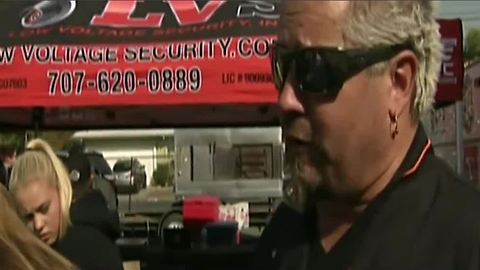 Guy Fieri cooks meals for California fire victims