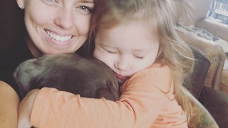 Snuggling pit bull is a cuteness overload