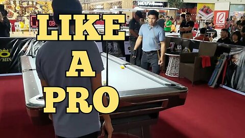 Manny Pacquiao playing pool like a pro