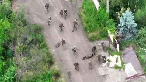 Footage of Ukraine counter attack fighters entering liberated settlement