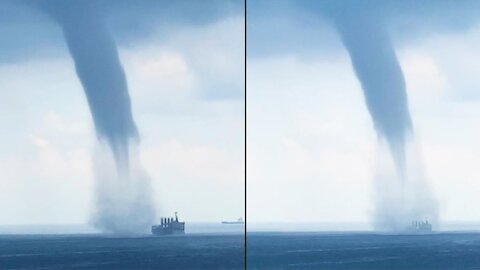 a ship gets caught in a giant waterspout near Singapore