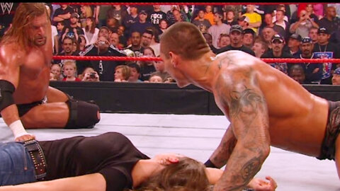 Randy Orton kisses an unconscious Stephanie McMahon right in front of Triple H.