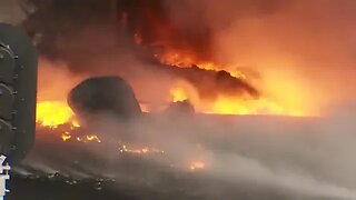 The pile of shredded tire pellets is on fire again near the Steel Bridge in Portland, Oregon.