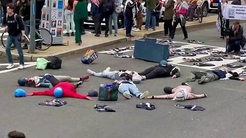 Dozens of pro-Palestinian activists gathered outside the Hilton Hotel in Washington, D.C