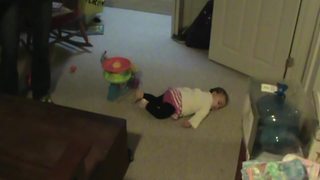 A Baby Girl Pretends To Sleep When Her Mom Turns The Vacuum