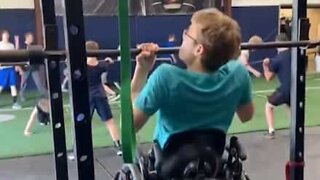 Young man confined to wheelchair impresses with pull ups!