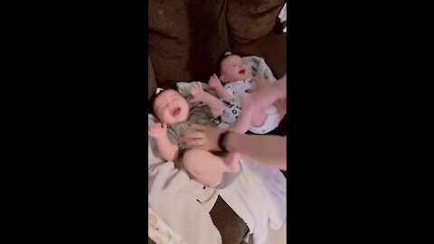 Wonderful laughs for two baby twins