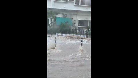 Tomigusuku and Naha, Japan, are experiencing flash flooding