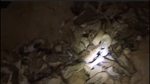 👿😈🔥😑UNDERGROUND LARGE PILE OF BONES AND CHILDRENS SHOES