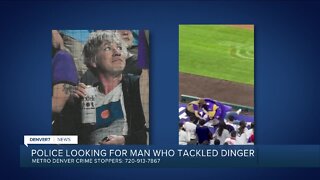 Denver police searching for fan who tackled Dinger during Rockies home game