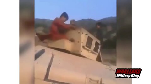 Afghan Kids Turn Humvee Turret Into Carousel