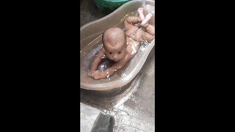 my little angel swimming in bathtub