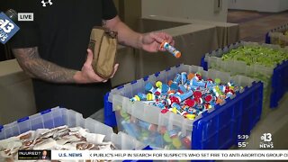 Las Vegas volunteers making 3,500 care packages for military service members