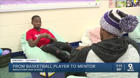 High school acts as both basketball player and mentor to 10-year-old