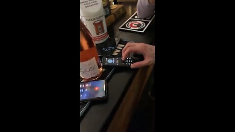 How to pop a cork out of a bottle using cell phones