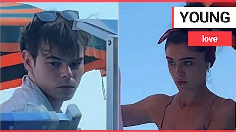 Stranger Things co-stars Natalia and Charlie relaxing on beach during romantic holiday to Italy