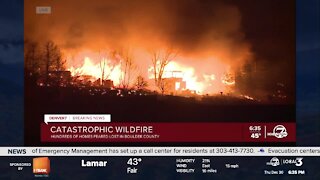 Structures up in flames in Louisville from wildfire