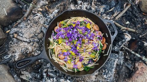 Cooking a Foraged Stirfry with Ramps and Violets.