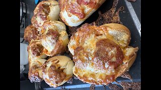 Cheesy meatball rolls