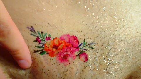 A beautiful rose tattoo on my hip