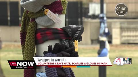 Scarves, gloves, & hats wrapped around Washington Square Park for homeless