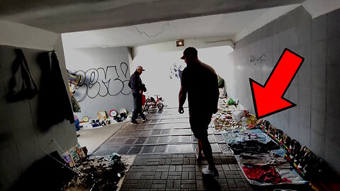 Hoarders in the underpass. Cool used stuff