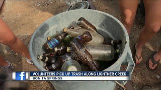 Volunteers clean up trash along Lightner Creek