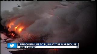 Fire crews still on the scene of tire warehouse fire