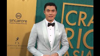 Henry Golding doesn't consider himself to be a heart-throb