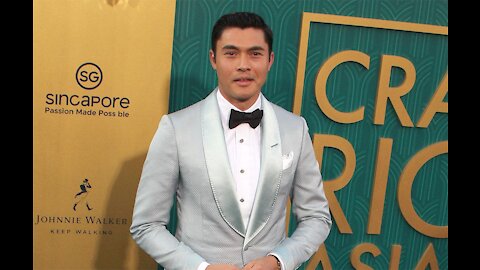 Henry Golding doesn't consider himself to be a heart-throb