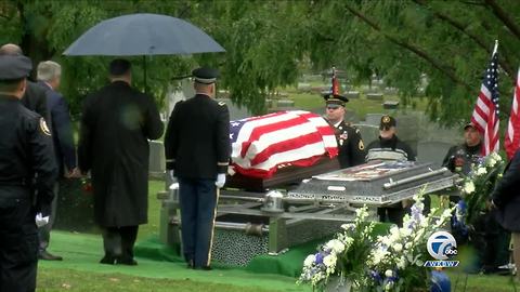 Officer Lehner's casket arrives at Forest Lawn Cemetery