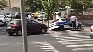 Woman crashes into a police car - Tehran